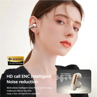 Woman wearing wireless earbuds with 'Denoise' technology label and product packaging.