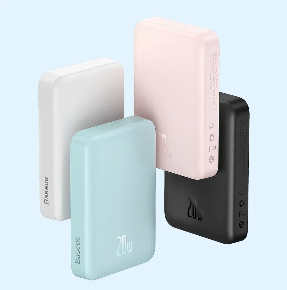 Four power banks in different colors on a light blue background
