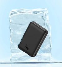Black rectangular device with '20W' branding on a block of ice against a light blue background