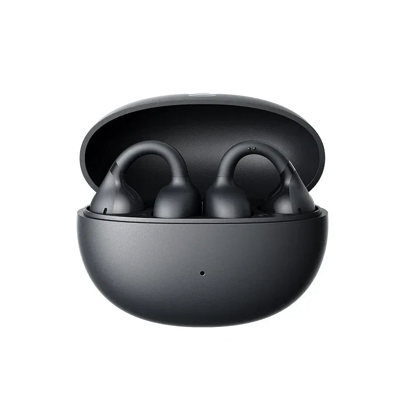 Black wireless earbuds in a round charging case on a white background