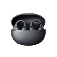 Black wireless earbuds in a round charging case on a white background