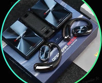 Monster headphones and accessories on a display stand with 'Traveler 3C' branding.